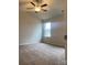Spacious bedroom with ceiling fan and carpeted floor at 1305 Dodd St, Shelby, NC 28152