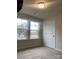 Empty bedroom with carpet flooring and windows offering natural light at 1305 Dodd St, Shelby, NC 28152