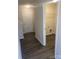 Hallway leading to a laundry room with washer/dryer hookups at 1305 Dodd St, Shelby, NC 28152