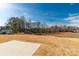 Large backyard with open space and concrete pad at 139 Commerce Blvd, Lancaster, SC 29720