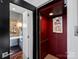 Red elevator with artwork and a view of a bathroom at 1401 Scotland Ave, Charlotte, NC 28207