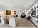 Living and dining area with artwork, unique shelving, and stylish furniture at 1401 Scotland Ave, Charlotte, NC 28207