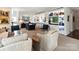 Living and dining area with lots of natural light, artwork, and shelving at 1401 Scotland Ave, Charlotte, NC 28207