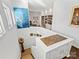 Staircase and loft area with white built in shelving at 1401 Scotland Ave, Charlotte, NC 28207