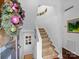 Entryway with staircase, holiday decor, and artwork at 1401 Scotland Ave, Charlotte, NC 28207