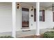 Inviting front entry with a covered porch and classic columns at 1976 Mcilwain Rd, Lancaster, SC 29720