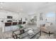 Open-concept kitchen and dining area with white cabinets, stainless steel appliances, and wood-look flooring at 482 Berryman Rd, Rock Hill, SC 29732