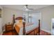 Inviting bedroom with a four-poster bed, wooden nightstands, and soft lighting at 815 Oak Embers Se Dr, Concord, NC 28025