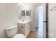 Clean bathroom with a vanity, toilet and shower at 8915 Hunter Ridge Dr, Charlotte, NC 28226