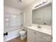 Clean bathroom with a shower/tub combo and white vanity at 8915 Hunter Ridge Dr, Charlotte, NC 28226