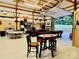 Spacious workshop with game tables, open garage door, and storage at 1011 Ratchford Rd # Lot 1&2, York, SC 29745