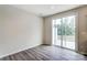 Breakfast nook with sliding glass door to patio and wood floors at 14910 Tamarack Dr, Charlotte, NC 28278