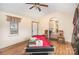 Bonus room featuring a pool table, ceiling fan, and an open doorway at 3814 Durham Ln, Charlotte, NC 28269