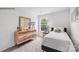 Cozy bedroom with wood dresser and a window at 524 Trading Post Ln, York, SC 29745