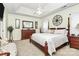 Spacious main bedroom with carpeted floors and wood furniture at 5361 Harvest Hill Dr, Harrisburg, NC 28075