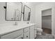 Modern bathroom with double vanity, large mirrors, and walk-in closet at 547 Old Mill Rd, Charlotte, NC 28206