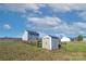 Storage shed in backyard of home with grassy area at 739 Bethesda Rd, Statesville, NC 28677