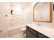 Bathroom with a bathtub, single vanity, and a decorative mirror at 739 Bethesda Rd, Statesville, NC 28677