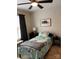 Bedroom with twin bed, nightstand and ceiling fan at 108 Sherman Oaks St, Mooresville, NC 28115