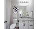 Elegant bathroom featuring granite countertop and white vanity at 1308 Pleasant Plains Rd, Matthews, NC 28105