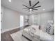 Main bedroom with plush bedding and lots of natural light at 1308 Pleasant Plains Rd, Matthews, NC 28105