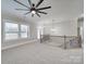 Open landing with a view of the lower level at 1308 Pleasant Plains Rd, Matthews, NC 28105