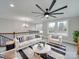 Bright living room with comfortable seating and large windows at 1308 Pleasant Plains Rd, Matthews, NC 28105