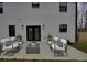 Relaxing patio with modern furniture and a spacious layout at 1308 Pleasant Plains Rd, Matthews, NC 28105