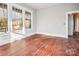 Bedroom with hardwood floors and several large windows offering natural light at 137 Lancaster St, Chester, SC 29706