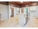 Kitchen with an island, stainless steel appliances, white cabinetry, and a stylish ceiling at 137 Lancaster St, Chester, SC 29706