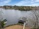 Lakefront boathouse with covered deck at 192 Diana Dr, Mount Gilead, NC 27306