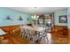 Bright dining area with wood floors and white chairs at 192 Diana Dr, Mount Gilead, NC 27306