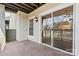 Covered balcony with sliding glass doors and outdoor light at 20105 Henderson Rd # J, Cornelius, NC 28031