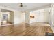 Spacious living and dining area with wood-look flooring and access to the kitchen at 20105 Henderson Rd # J, Cornelius, NC 28031