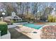 Community pool covered for the season with a pool house at 20105 Henderson Rd # J, Cornelius, NC 28031