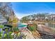 Covered pool, wooden deck, and lake view at 20105 Henderson Rd # J, Cornelius, NC 28031