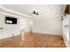 Living room with hardwood floors and a mounted TV at 2053 Boxcar Rd, Lancaster, SC 29720