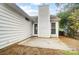 Small concrete patio adjacent to house at 2321 Linda Lou Ct, Charlotte, NC 28213