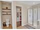 Main bathroom showcasing walk-in shower, toilet, and a well-organized closet at 2323 Barrowcliffe Nw Dr, Concord, NC 28027