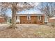 Brick home with a patio and large backyard at 3112 Cedarhurst Dr, Charlotte, NC 28269