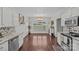 Eat-in kitchen with granite countertops and white cabinets at 4004 Camden Oaks Ln, Monroe, NC 28110