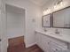 Bright bathroom boasts double sinks, new vanity, and updated fixtures at 616 Highland Ave, Statesville, NC 28677