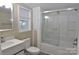 Bathroom with white vanity, sliding glass shower doors, and modern fixtures at 714 Webber Ave, Chester, SC 29706