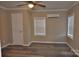 Simple bedroom with neutral walls, wood-look floors, and ample natural light at 714 Webber Ave, Chester, SC 29706