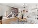 Living room with butterfly wall art, chandelier, and comfortable seating at 786 Stratford Run Dr, Fort Mill, SC 29708