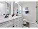 Modern bathroom with double vanity, shower, and toilet at 1051 Barnette Farm Ln, Monroe, NC 28110