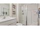 Clean, modern bathroom with white vanity, glass shower, and decorative towels at 12157 Lady Bell Dr, Charlotte, NC 28278