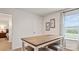 Bonus room with a table, chairs, and view of another room at 12157 Lady Bell Dr, Charlotte, NC 28278