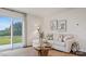 Cozy living room with sliding glass door leading to the backyard at 12157 Lady Bell Dr, Charlotte, NC 28278