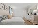 Large main bedroom featuring a comfortable bed and stylish dresser at 12157 Lady Bell Dr, Charlotte, NC 28278